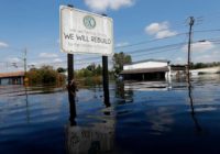 The Latest: NC watching coal ash sites swamped by floods