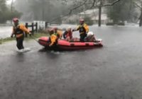 Man in chicken suit kayaks down flooded street in North Carolina after Hurricane Florence