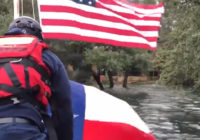 Firefighters rescue US, Texas flags from floods