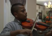 11-year-old violinist, cancer survivor plays national anthem for Hurricanes