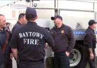 Houston-area firefighters return from California