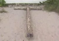 Woman says cross made for her brother on Hatteras Inlet washes up on Florida beach after being swept away by Hurricane Michael