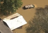 Aerial views show devastating flooding in Huffman