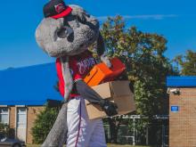 Photos: East Wake receives equipment from Carolina Mudcats