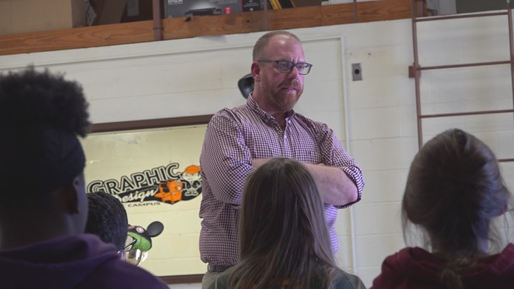 North Central Band director speaks to students