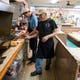 Nick Gomez, left, and Jesse Lerma prepare to-go orders at Hamlin Fountain & Gifts + Bakery on Friday, March 20, 2020. Beginning Saturday, orders can be placed via phone and employees will deliver it to vehicles or customers can pick it up at the front register. The soda fountain has been in business since 1960.