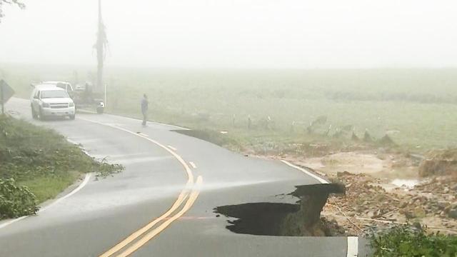 Mother rescued, children missing after car swept away in Smithfield floodwaters