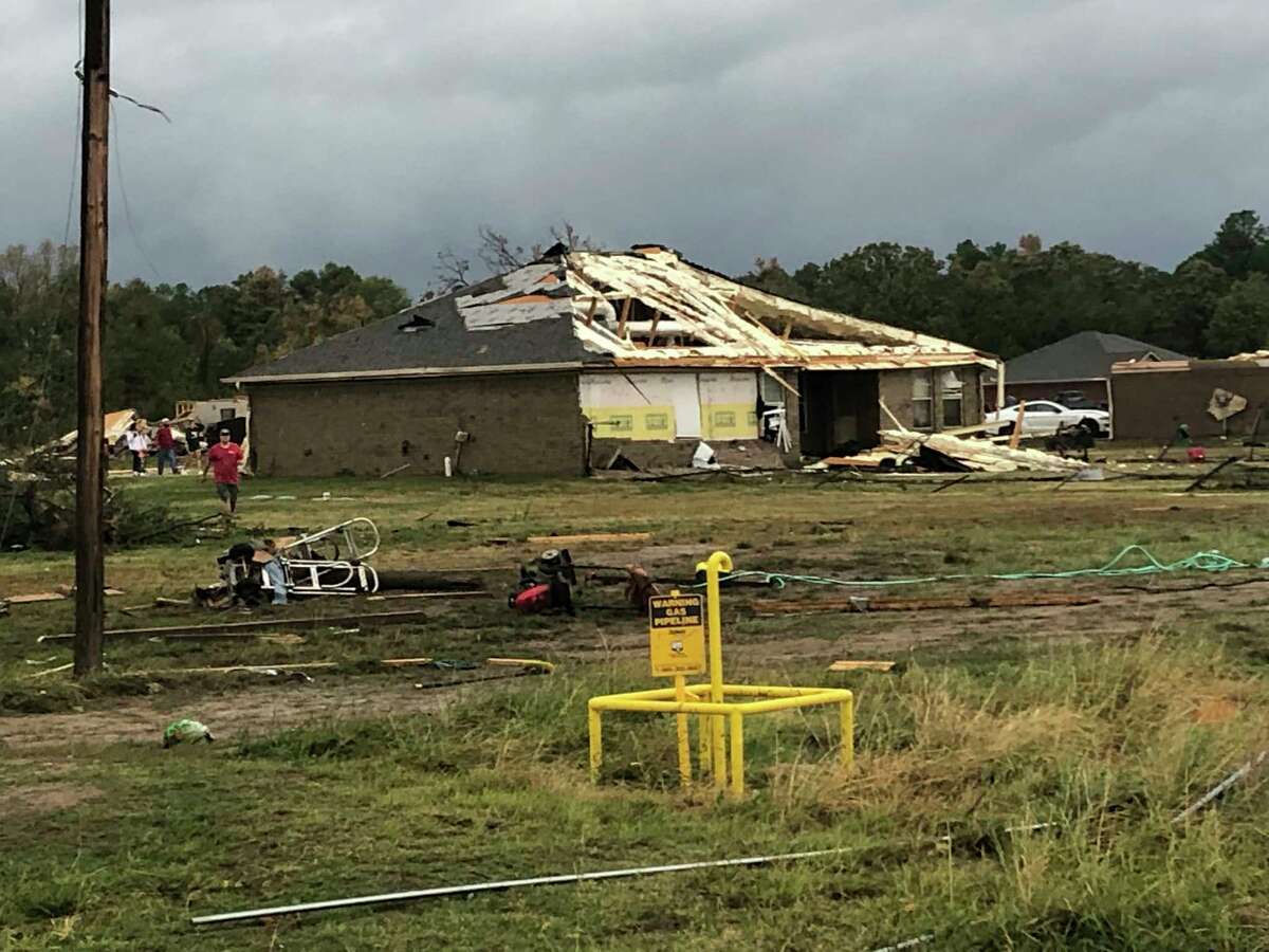 Scenes of devastation are visible in all directions along Lamar County Road 35940, west of State Highway 271, after a massive tornado hit the area, causing extensive damage and destroying an unknown number of homes, Friday, Nov. 4, 2022 in Powderly, Texas. (Jeff Forward/The Paris News via AP)