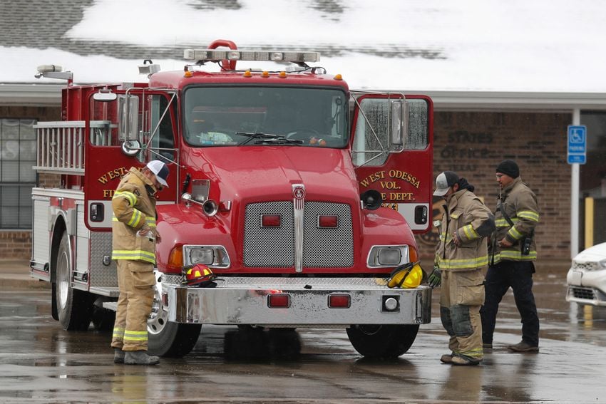 Members of the West Odessa Volunteer Fire Department ready their equipment in Fritch, Tx. Residents have been working to recover from the Tuesday grass fires that devastated parts of the panhandle.