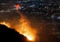 Firefighters battle to control devastating Los Angeles wildfires as ferocious winds calm somewhat