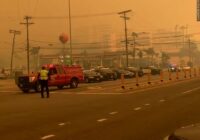 Thousands flee as wildfires burn out of control and destroy homes across the Los Angeles area